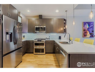 Gourmet kitchen with new refrigerator and dishwasher