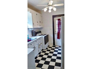 Kitchen leads to back porch