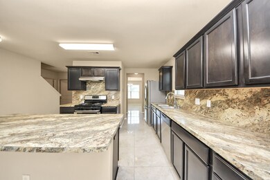 Open kitchen layout with great counter and cabinet