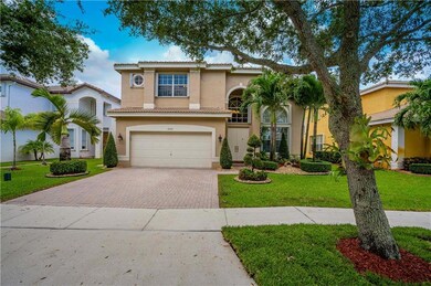Spacious 2 car garage with long driveway to accomm