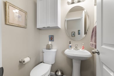 Half bath featuring toilet