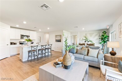 14176 Hemingway Oaks Trail, Fort Myers, FL 33905 - photo 6