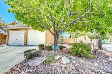 Exterior Front with desert landscaping and large s