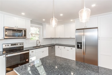 Kitchen with granite countertops