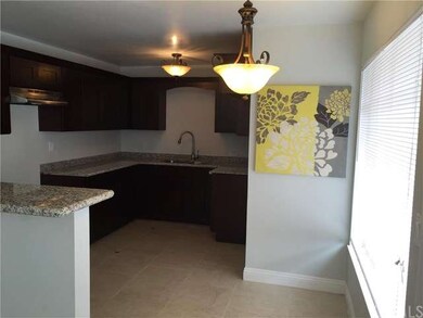 CUSTOM DESIGN KITCHEN WITH ESPRESSO CABINETS, GRAN