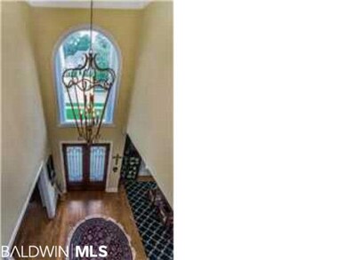 Front door/ foyer view from stairwell