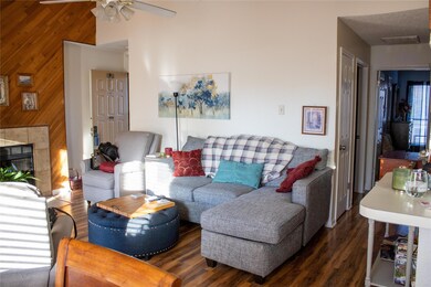 Living room and hallway to bedrooms and bathroom