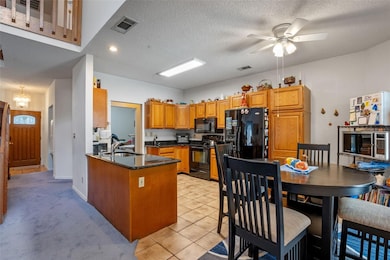 OPEN KITCHEN WITH EAT-IN SPACE