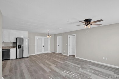 Double doors go to back patio.
