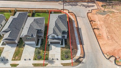 This home sits on a large CORNER lot with ample ya