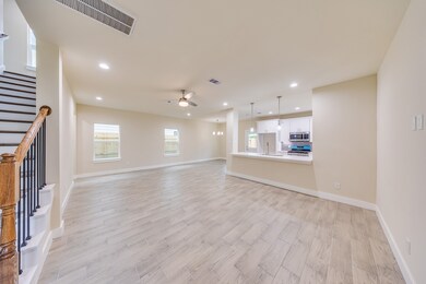 Enjoy a bright and open living room on the first f