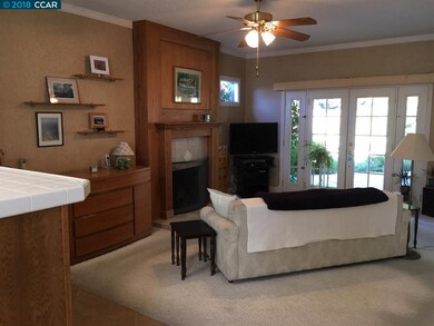 Gas fireplace -doors to backyard patio