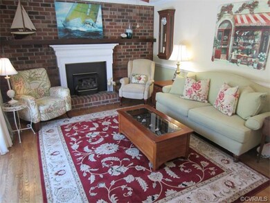The Open Family Room also has Crown Molding, Chair