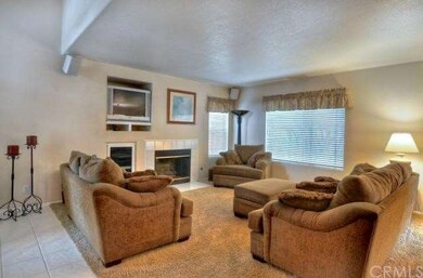 Tiled entry leads to the spacious Family Room.