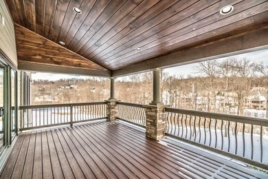The low maintenance deck with stone pillars is enh