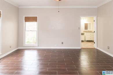 Nice sized master bedroom with newer tile floor. N
