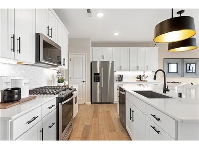 Kitchen comes with modern stainless steel applianc