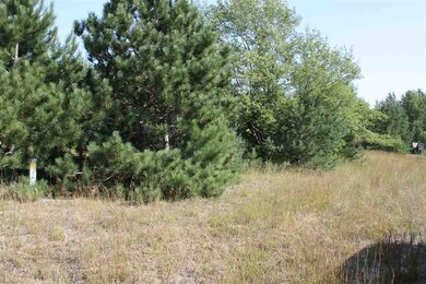 standing approximately at the Northwestern corner.
