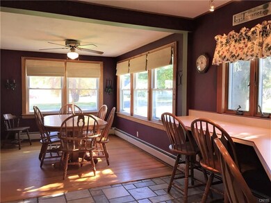 Formal dining room and breakfast bar area off of k