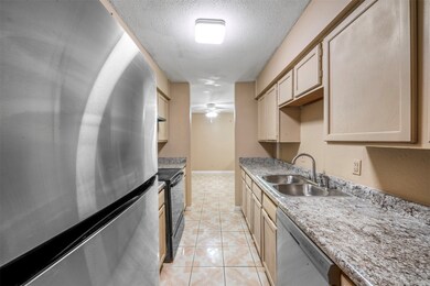 Cozy galley kitchen with plenty of countertops, am