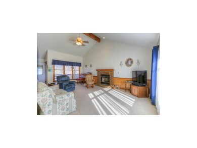 Vaulted Great room is flooded with lots of light, 