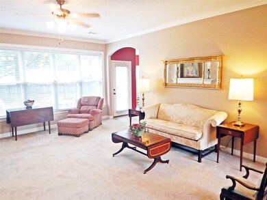 Opens into the entryway and the Dining room