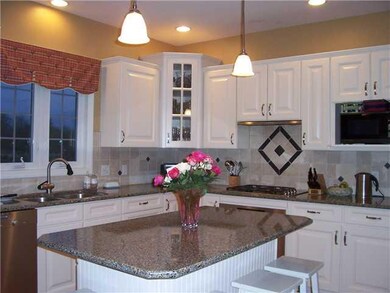 Kitchen Meile appliances, quartz counters, custom 