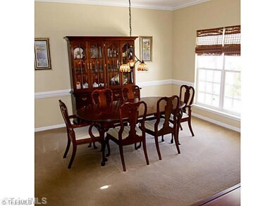 Dining Room. Formal Dining Room with Crisp Chair and Crown Moulding!