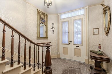 Entrance provides a regal and welcoming feel for y