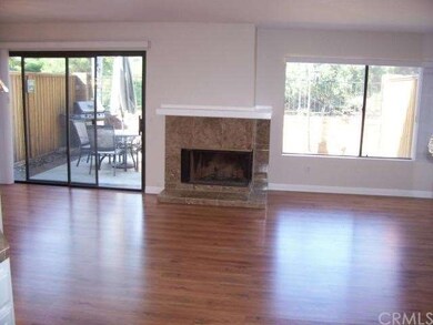 Spacious living/dining great room effect.