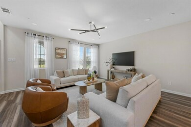 Living room with wood-type flooring