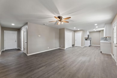 Unfurnished living room featuring recessed lighti