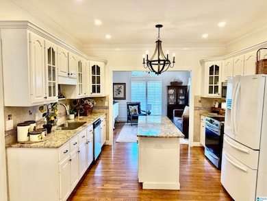 Opens into the keeping Room/Formal Dining Rm