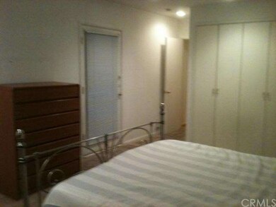 Master Bedroom,door to backyard deck
