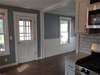 Kitchen looking into dining room
