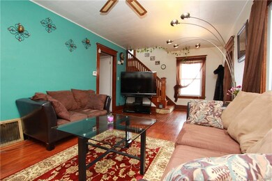 View of living area from front corner of room. Not