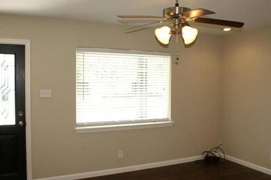 Large living area at front of home is light and br