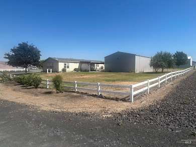 View of front of property featuring an outbuilding and an outdoor structure