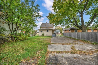Back of property with a chimney
