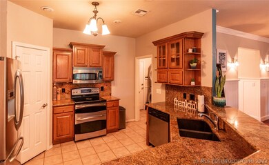 This stunning home features granite countertops in