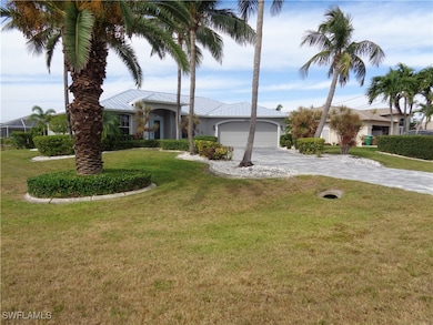 Ranch-style home with an attached garage, driveway