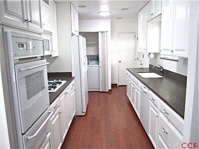 Convenient closet with laundry facilities in the k