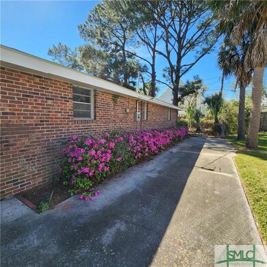 Long cement paved Driveway for lots of Parking!