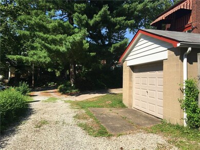 Large pickup truck can fit in this garage that is 