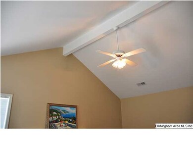 Vaulted ceiling with fan