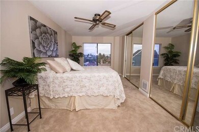 Generous sized bedroom with two large mirrored clo
