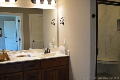 Double vanity, tile shower, HUGE master closet and