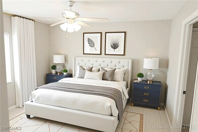 Bedroom with light tile patterned floors, baseboar