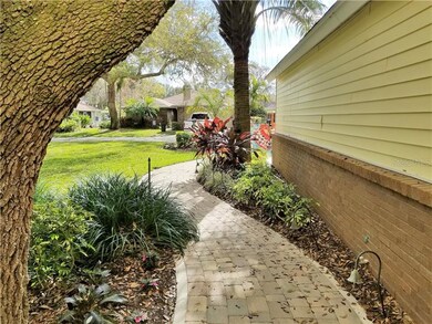 The view from the front door, darling paver pathwa