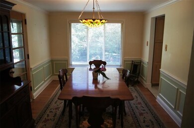 Freshly Painted Dining Room with Crown and Picture